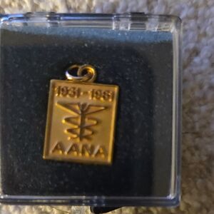 Gold AANA Pendant